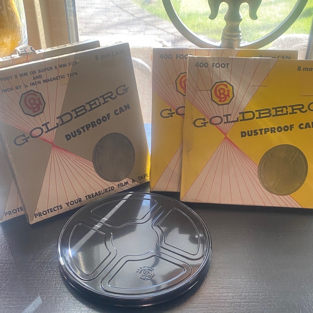 5 Goldberg Dustproof 8mm Films & Tapes with Black Metal Lids comes w/boxes